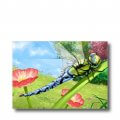 Postkarte "Libelle". Man sieht eine Königslibelle in Großaufnahme auf einem Blumenstiel sitzen.